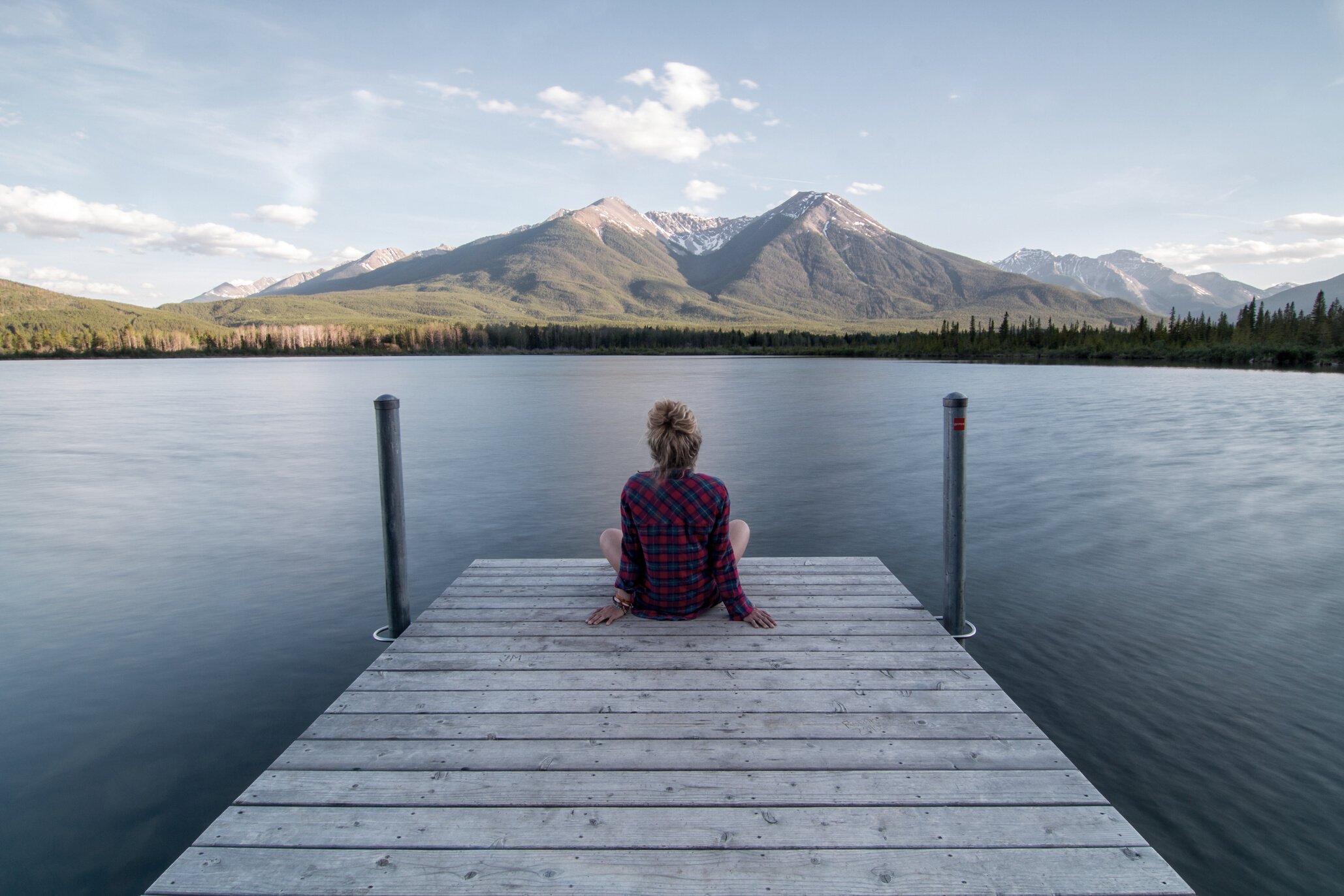 Woman Seating by the Jetty